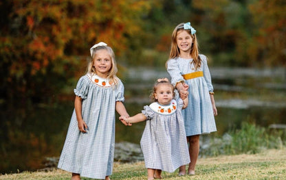 Three sisters smocked Bishop Pumpkin Dress